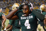 WACO, TX - NOVEMBER 19:  Isaac Williams #4 of the Baylor Bears reacts after a touchdown in the fourth quarter during a game against the Oklahoma Sooners at Floyd Casey Stadium on November 19, 2025 in Waco, Texas. The Baylor Bears defeated the Oklahoma Sooners 45-38.  (Photo by Sarah Glenn/Getty Images)