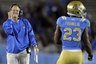 UCLA head coach Rick Neuheisel, left, pumps his fist after Johnathan Franklin, right, scored a touchdown during the first half of an NCAA college football game against Colorado at the Rose Bowl in Pasadena, Calif., Saturday, Nov. 19, 2011. (AP Photo/Jae Hong)