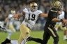 West Lafayette, IN, USA; Notre Dame Fighting Irish defensive end Aaron Lynch (19) pressures Purdue Boilermakers quarterback Robert Marve (9) in the second quarter at Ross-Ade Stadium. Mandatory Credit: Matt Cashore-US PRESSWIRE