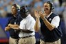 North Carolina head coach Butch Davis, right, encourages his team against LSU in the first half during a NCAA college football game at the Georgia Dome on Saturday, Sept. 4, 2010, in Atlanta. (AP Photo/Erik S. Lesser)