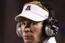 Arizona's head football coach Mike Stoops watches the game from the sidelines during the first half of an NCAA college football game against Northern Arizona at Arizona Stadium in Tucson, Ariz., Saturday, Sept. 12, 2008. (AP Photo/John Miller)