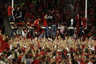 MADISON WI - OCTOBER 16: Fans of the Wisconsin Badgers storm the field and climb the goal post after a win over the Ohio State Buckeyes at Camp Randall Stadium on October 16 2010 in Madison Wisconsin. Wisconsin defeated Ohio State 31-18. (Photo by Jonathan Daniel/Getty Images)