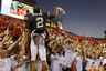 AUBURN AL - OCTOBER 16:  Quarterback Cam Newton #2 of the Auburn Tigers celebrates with the crowd after the game against the Arkansas Razorbacks at Jordan-Hare Stadium on October 16 2010 in Auburn Alabama.  The Tigers beat the Razorbacks 65-43.  (Photo by Mike Zarrilli/Getty Images)