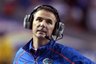 FILE - In this Dec. 5, 2009 file photo, Florida coach Urban Meyer stands on the sideline during the Southeastern Conference championship NCAA college football game at the Georgia Dome in Atlanta. The Associated Press reports on Saturday, Dec. 26, 2009, that Meyer is stepping down as coach of the University of Florida football team. (AP Photo/Dave Martin, File)