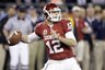 Oklahoma quarterback Landry Jones winds up to throw a pass against Connecticut in the second quarter of the Fiesta Bowl  NCAA football game Saturday, Jan. 1, 2011, in Glendale, Ariz. (AP Photo/Paul Connors)