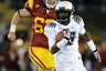 LOS ANGELES CA - OCTOBER 30:  Cliff Harris #13 of the Oregon Ducks runs past Chris Pousson #62 of the USC Trojans during the second quarter at Los Angeles Memorial Coliseum on October 30 2010 in Los Angeles California.  (Photo by Harry How/Getty Images)